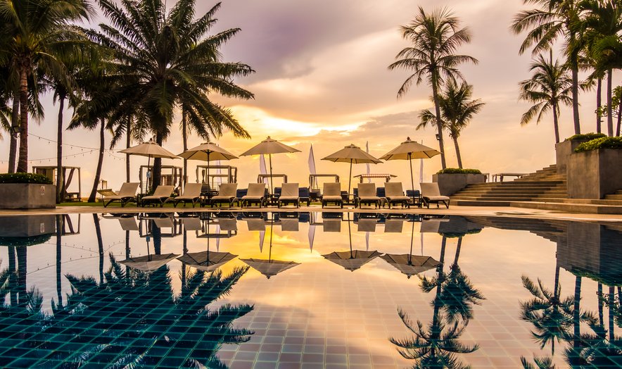 Resort pool at sunset